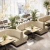 A restaurant with many booths and tables in it